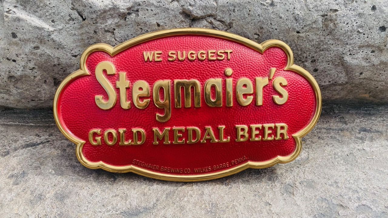 Stegmaier gold metal beer sign Bastian Brothers Company Rochester